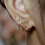 Rose gold rococo baroque inspired scroll work earring. Handcrafted and finished. Worn on ear with curated piercing design