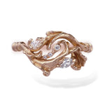 Rose gold rococo baroque inspired scroll work ring featuring brilliant cut pear, marquise and accent diamonds. Handcrafted and finished.