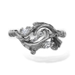 White gold rococo baroque inspired scroll work ring featuring brilliant cut pear, marquise and accent diamonds. Handcrafted and finished.