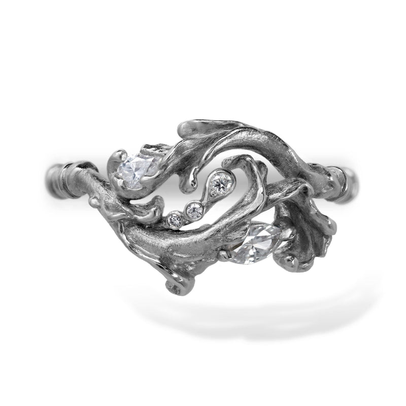 White gold rococo baroque inspired scroll work ring featuring brilliant cut pear, marquise and accent diamonds. Handcrafted and finished.