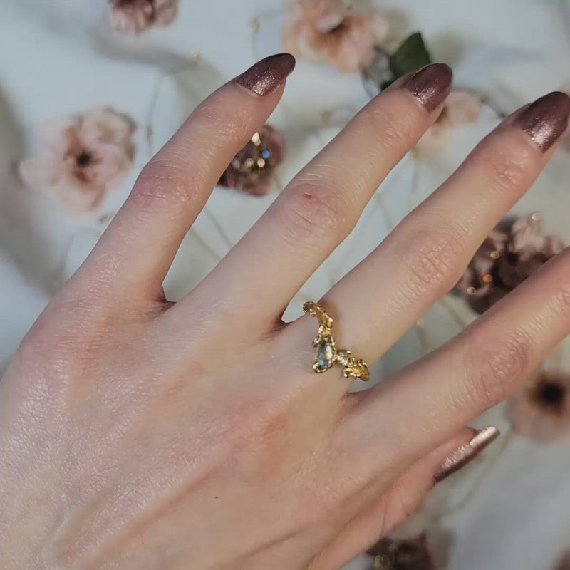 Rose gold rococo baroque inspired scroll work ring featuring a rose cut labradorite and diamond. Handcrafted and finished. Video if ways to wear rings